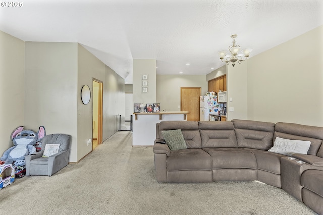 4118/4120 S E St, Springfield, OR 97478 - living room with light colored carpet, a chandelier, and recessed lighting