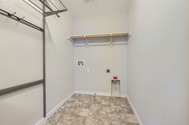 laundry area featuring electric dryer hookup, hookup for a washing machine, and baseboards