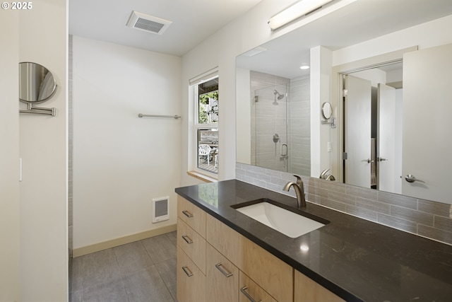 8630 SW 61st Ave, Portland, OR 97219 - full bathroom with a stall shower, vanity, and baseboards