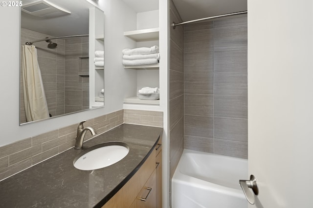 8630 SW 61st Ave, Portland, OR 97219 - bathroom featuring decorative backsplash and vanity