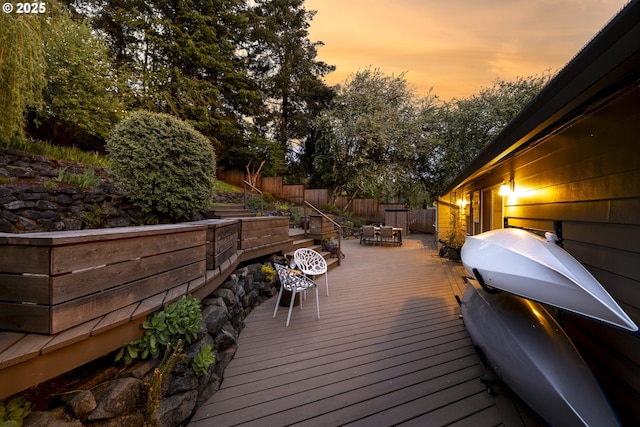 8630 SW 61st Ave, Portland, OR 97219 - deck at dusk with fence and outdoor dining space