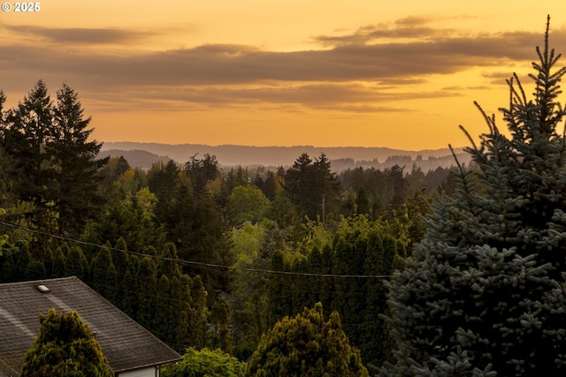 8630 SW 61st Ave, Portland, OR 97219 - view of mountain backdrop with a forest