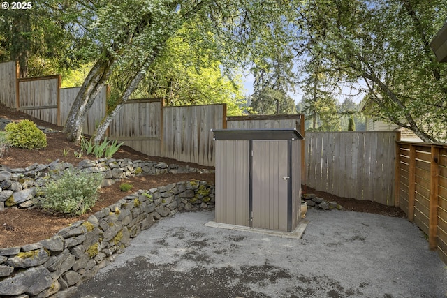 8630 SW 61st Ave, Portland, OR 97219 - fenced backyard featuring an outdoor structure and a shed