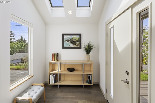 8630 SW 61st Ave, Portland, OR 97219 - doorway to outside featuring dark wood-style floors, baseboards, a skylight, and recessed lighting