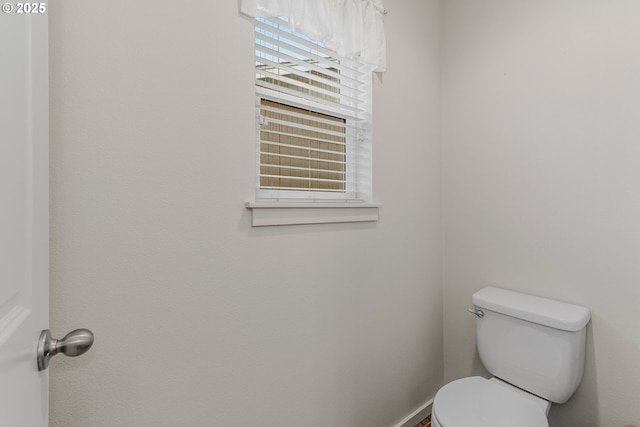 bathroom featuring toilet