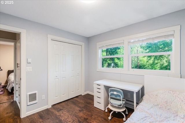 6926 SE Deardorff Rd, Portland, OR 97236 - bedroom with baseboards, dark wood-style floors, and a closet