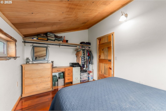 bedroom with wood ceiling, lofted ceiling, and wood finished floors