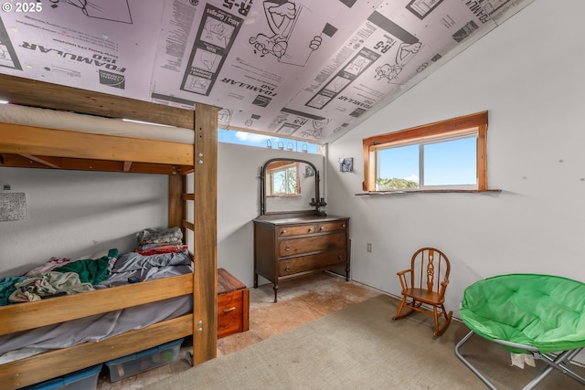 bedroom with lofted ceiling