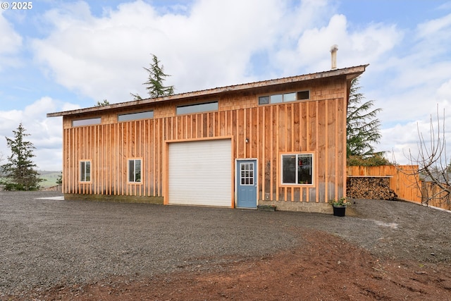 garage with fence