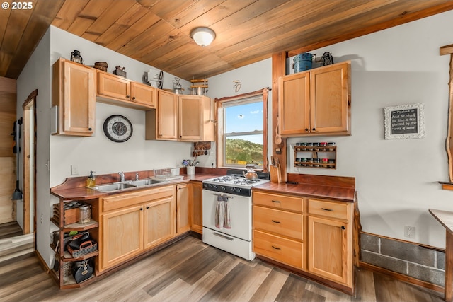 kitchen with white range with gas stovetop, wood ceiling, light brown cabinetry, and a sink