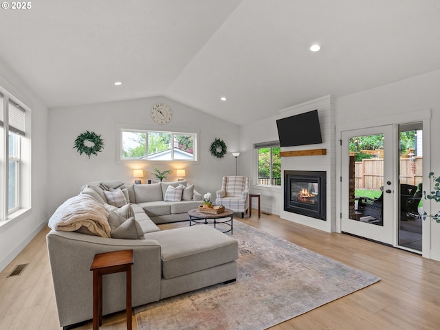 3595 Balm St S, Salem, OR 97302 - living area featuring lofted ceiling, wood finished floors, a large fireplace, and recessed lighting