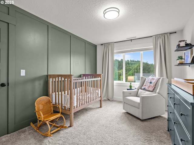 3595 Balm St S, Salem, OR 97302 - carpeted bedroom with a textured ceiling and a crib