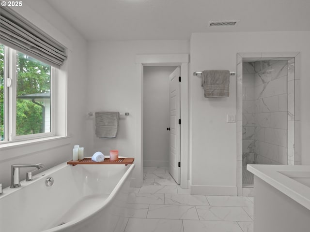 3595 Balm St S, Salem, OR 97302 - bathroom featuring marble finish floors, a freestanding tub, tiled shower, and vanity