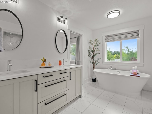 3595 Balm St S, Salem, OR 97302 - bathroom with double vanity, marble look tile flooring, and a soaking tub