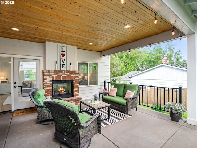 3595 Balm St S, Salem, OR 97302 - view of patio / terrace with an outdoor living space with a fireplace