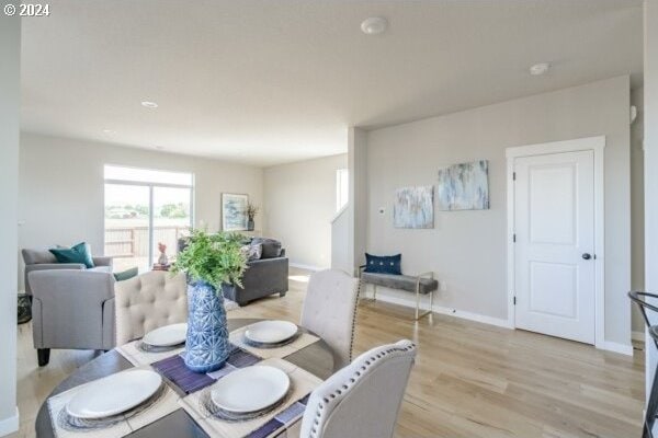 dining room featuring light hardwood / wood-style flooring