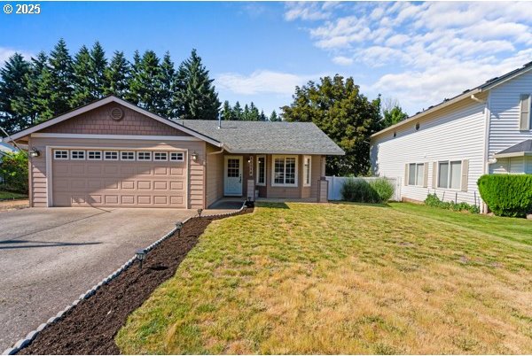 10514 NE 96th St, Vancouver, WA 98662 - ranch-style home featuring an attached garage, concrete driveway, and a front yard