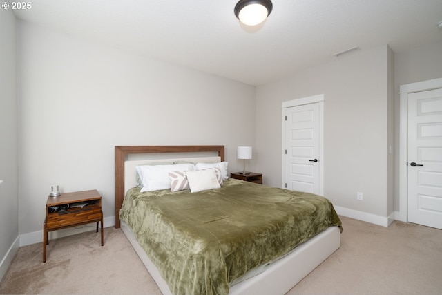 bedroom featuring carpet