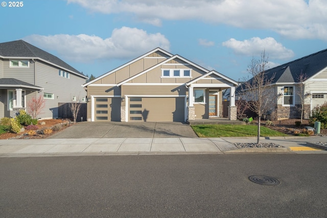 craftsman house with a garage