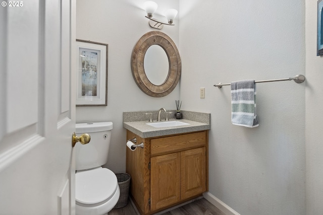 17958 Saint Clair Dr, Lake Oswego, OR 97034 - half bathroom with vanity and wood finished floors