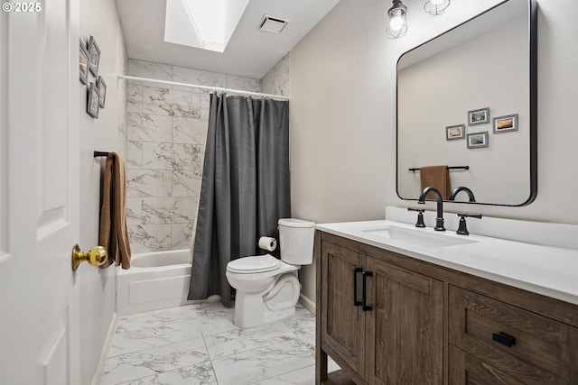 17958 Saint Clair Dr, Lake Oswego, OR 97034 - full bath with marble look tile flooring, a skylight, vanity, and shower / bath combo