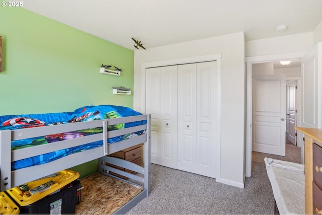 bedroom featuring a closet and carpet