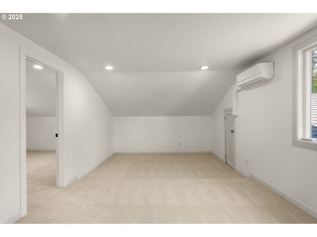 bonus room with recessed lighting, light colored carpet, lofted ceiling, and a wall mounted AC