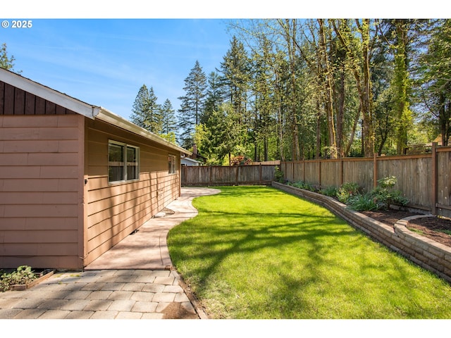 view of yard featuring a fenced backyard