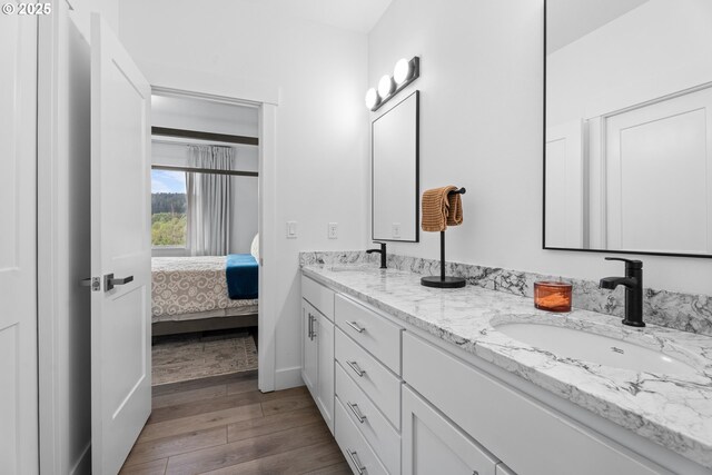 50322 Briarwood Ct, Scappoose, OR 97056 - full bath featuring wood finished floors, double vanity, and ensuite bathroom