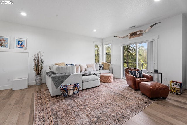 50322 Briarwood Ct, Scappoose, OR 97056 - living area with hardwood / wood-style floors and recessed lighting
