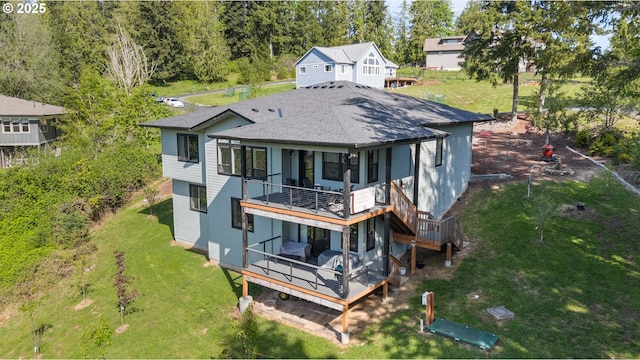 50322 Briarwood Ct, Scappoose, OR 97056 - rear view of house featuring a shingled roof, a yard, stairs, and a wooden deck