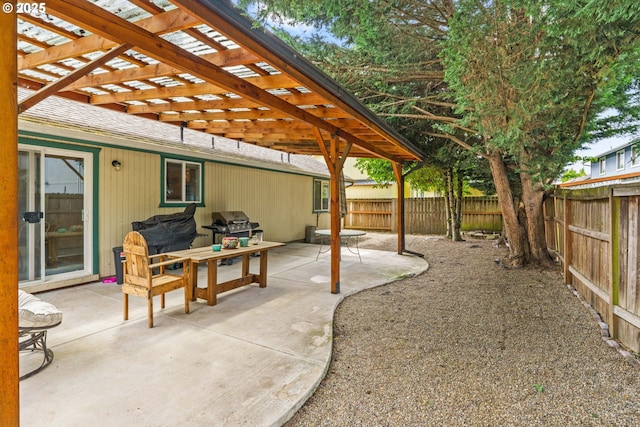 3318 Pinyon St, Springfield, OR 97478 - fenced backyard featuring a pergola, grilling area, and a patio