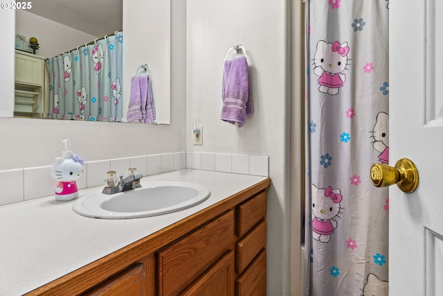 3318 Pinyon St, Springfield, OR 97478 - full bathroom featuring vanity, decorative backsplash, and a shower with shower curtain