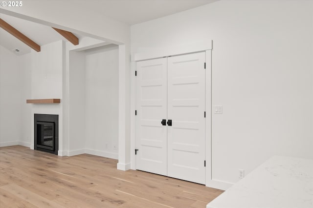 unfurnished living room featuring light hardwood / wood-style floors