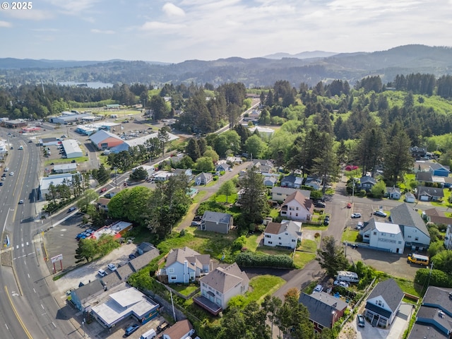 1749 NE 19th St, Lincoln City, OR 97367 - aerial view of property's location with a mountainous background