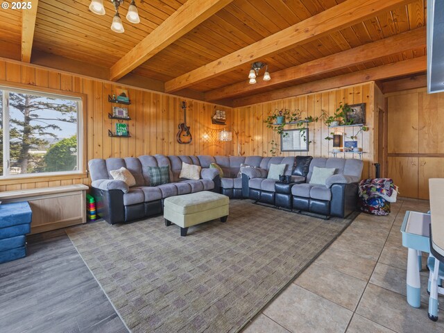 1749 NE 19th St, Lincoln City, OR 97367 - living area featuring wooden walls, wood ceiling with exposed beams, and light tile patterned floors