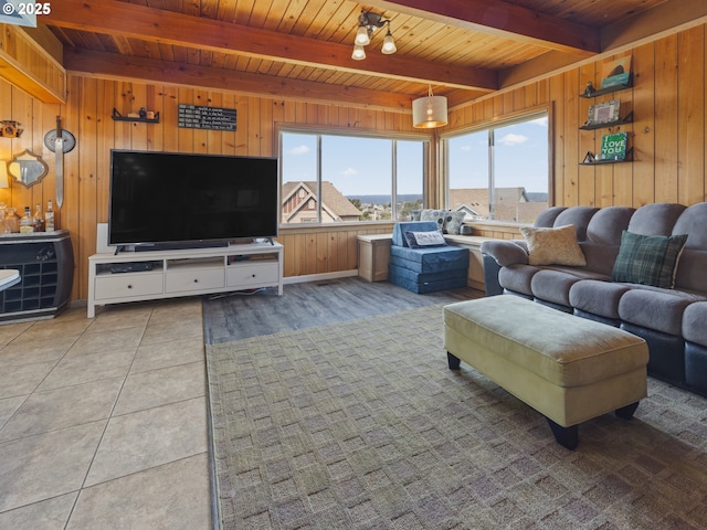 1749 NE 19th St, Lincoln City, OR 97367 - living area with wood ceiling with exposed beams, wooden walls, and light tile patterned floors