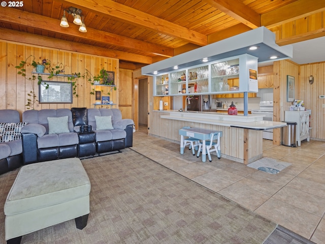 1749 NE 19th St, Lincoln City, OR 97367 - living area featuring wood walls, wooden ceiling with exposed beams, and light tile patterned floors
