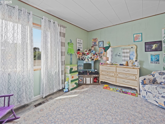 1749 NE 19th St, Lincoln City, OR 97367 - bedroom featuring wood finished floors and crown molding