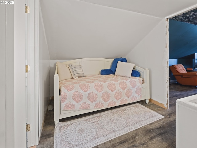 1749 NE 19th St, Lincoln City, OR 97367 - bedroom with vaulted ceiling, wood finished floors, and baseboards