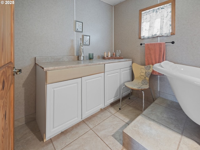 1749 NE 19th St, Lincoln City, OR 97367 - full bathroom with a freestanding tub, vanity, and tile patterned floors