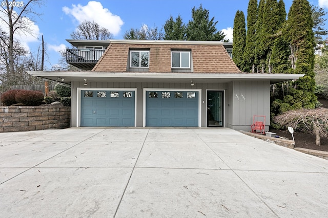 exterior space with concrete driveway