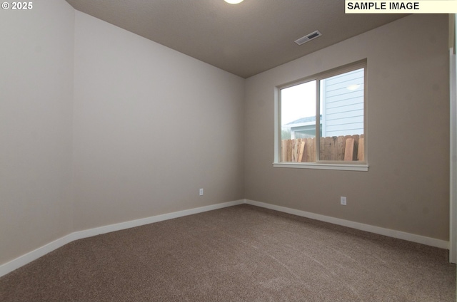 empty room with carpet floors