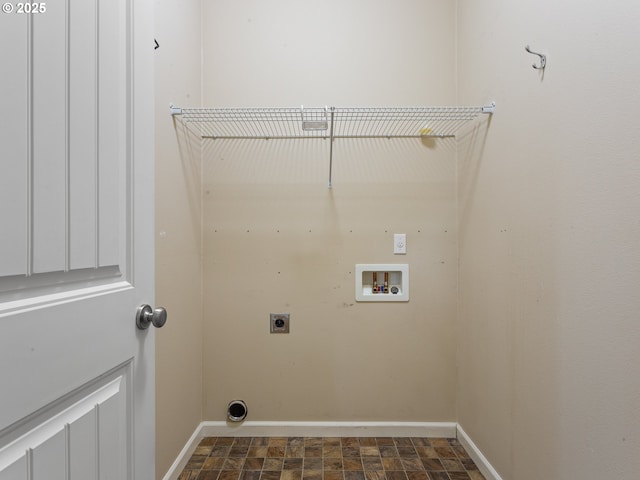 washroom featuring laundry area, hookup for a washing machine, hookup for an electric dryer, and baseboards