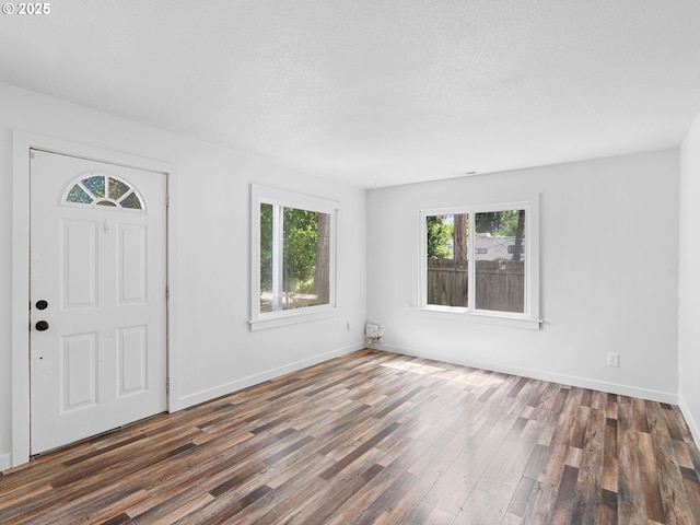 2745 SW 187th Ave, Beaverton, OR 97003 - entryway with wood finished floors and a textured ceiling