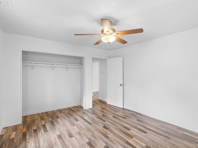 2745 SW 187th Ave, Beaverton, OR 97003 - unfurnished bedroom featuring a closet, wood finished floors, and ceiling fan