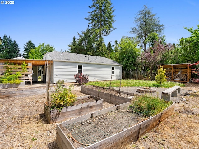 2745 SW 187th Ave, Beaverton, OR 97003 - view of yard with a vegetable garden and a fire pit