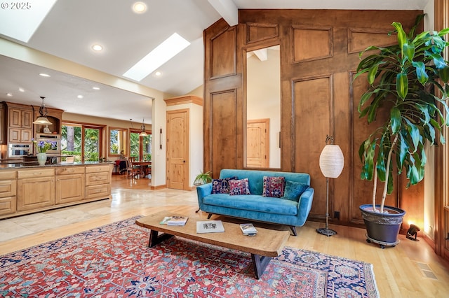 1209 NW 80th St, Vancouver, WA 98665 - living room with light wood-type flooring, a skylight, and recessed lighting