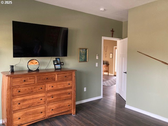 bedroom featuring dark hardwood / wood-style floors