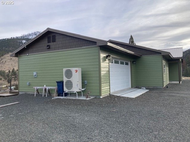 exterior space with a garage